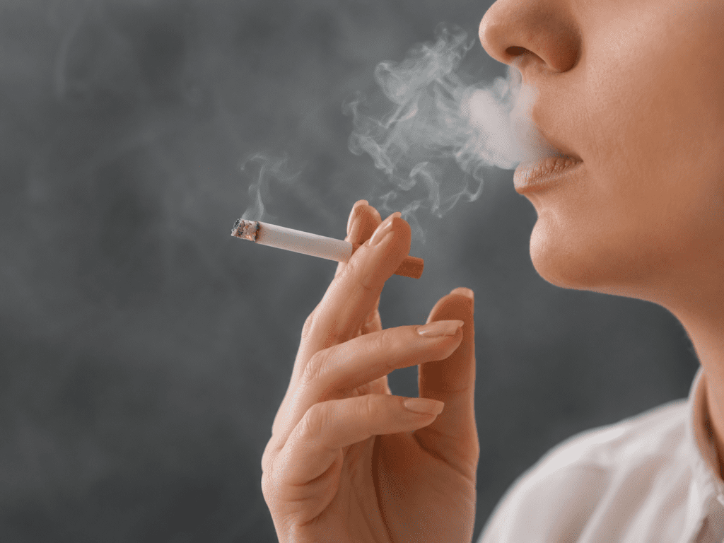 a person smoking a cigarette