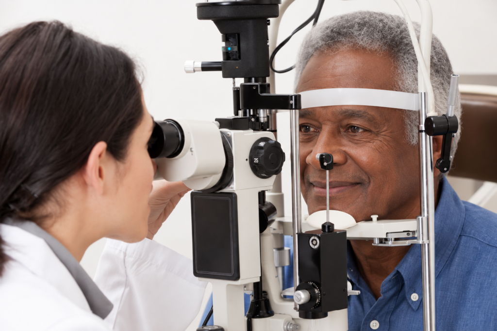 a man having an eye exam from a female doctor